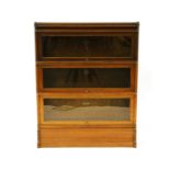 An oak three tier oak Globe Wernicke bookcase