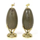 An unusual pair of decorative Chinese silver gilt mounted 'eggs'