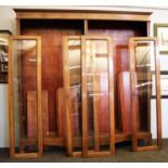 A large Edwardian walnut bookcase