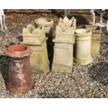 A pair of terracotta chimney pots
