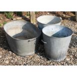 A galvanised tub and two pails
