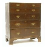 A George III two part oak chest,