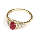 A gold, ruby and diamond ring