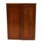 A mahogany collector's cabinet