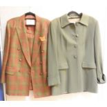 Four Aquascutum ladies suit jackets, all with skirts including a red wool example, a green wool