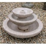 A three tier granite fountain, 85cm x 50cm