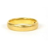 A 22ct gold court shaped wedding rings