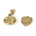 A Victorian three row ribbon picture locket, tested as approximately 9ct gold, 2.53g, and another