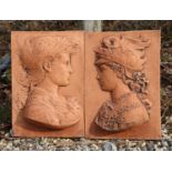 A pair of Renaissance style terracotta garden wall plaques, 46 high x 29 wide