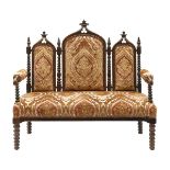 A French Gothic walnut three-seater settee
