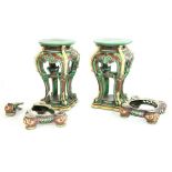 A pair of Victorian Majolica jardinière stands