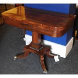 A Regency brass inlaid card table