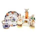 Five various Staffordshire figures, two ironstone jugs and nine ironstone plates and a dog