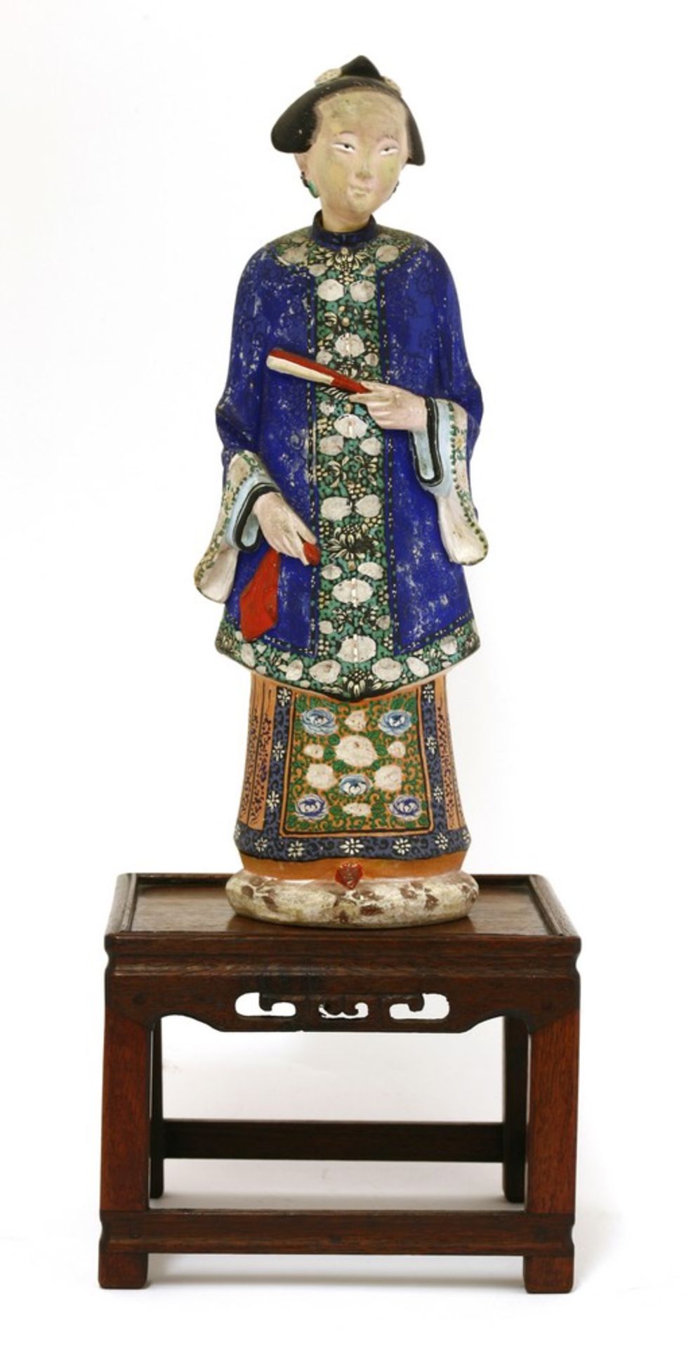 A Chinese painted clay nodding-head figure