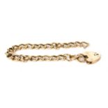 A hollow gold curb chain bracelet,