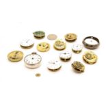 A collection of pocket watch movements,