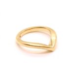 A gold half wishbone ring