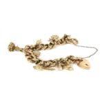 A 9ct gold hollow curb chain charm bracelet,