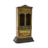 An early 20th Century Hartwig and Vogel chocolate tin mechanical vending machine