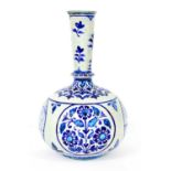 A Persian blue and white bottle vase