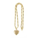 A 9 carat gold heart shaped pendant on chain