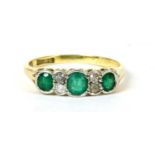 A three stone emerald ring