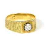 A gold square head single stone diamond ring