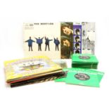 A collection of The Beatles LPs