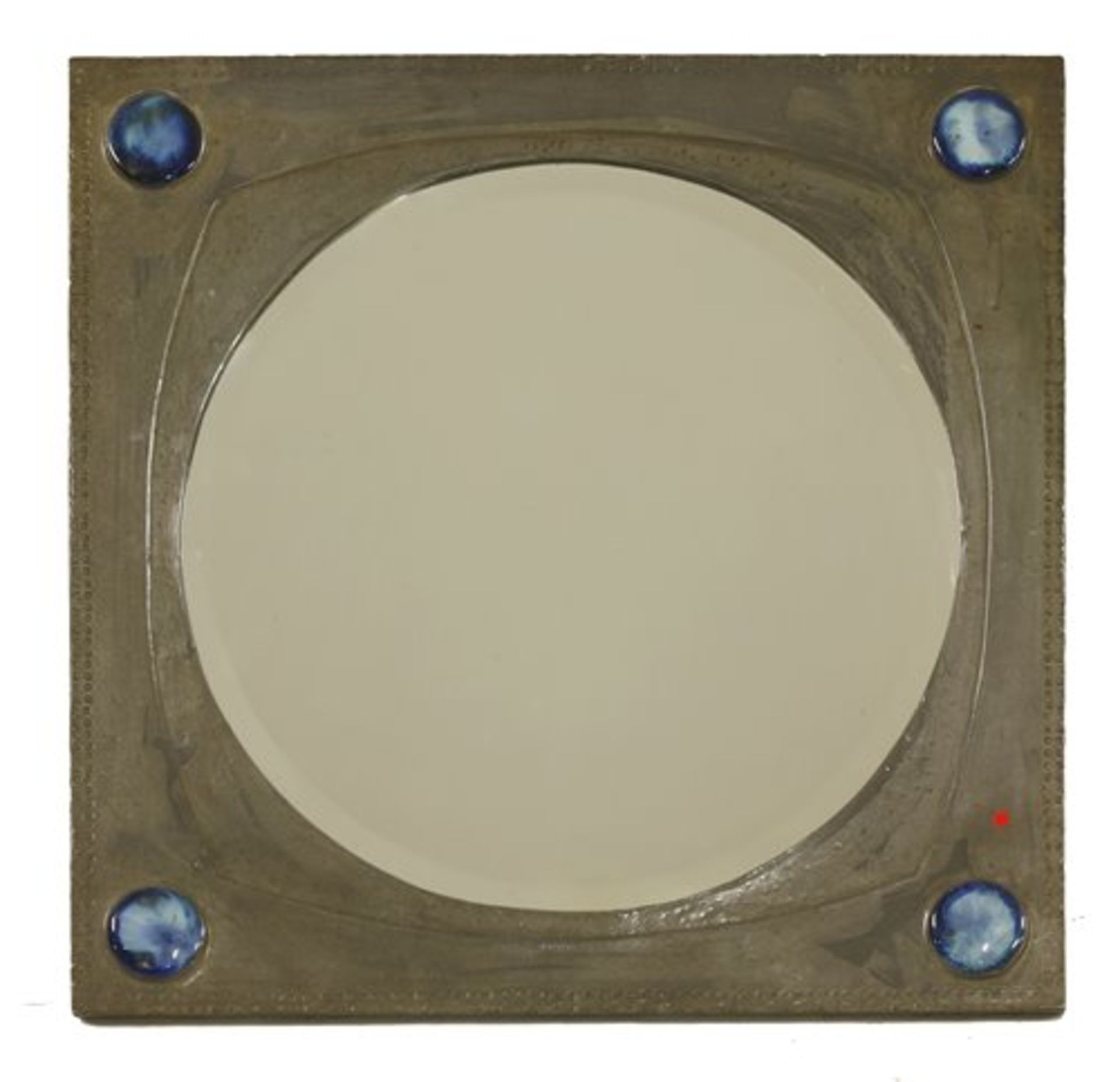 An Arts and Crafts pewter mirror