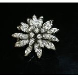 A French white gold, diamond set flower head brooch/pendant, c.1950,