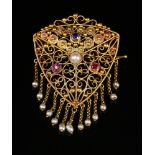 A gold, sapphire, ruby and seed pearl brooch, c.1900,