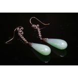 A pair of Art Deco jade and diamond drop earrings