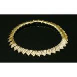 An 18ct gold diamond set collar,