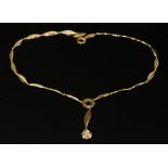 An 18ct gold diamond set 'Y' necklace