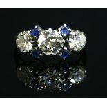 An 18ct gold diamond and sapphire ring