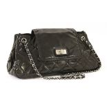 A Chanel black patent leather re-issue Accordion flap handbag