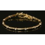 An 18ct gold diamond bracelet by Eric Smith, c.2009,