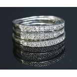 A 9ct white gold five row diamond band ring