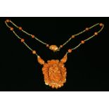 An Italian gold and carved coral necklace