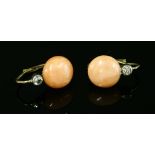 A pair of Continental coral and diamond earrings, c.1925,