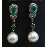 A pair of two colour gold, emerald, diamond and South sea pearl drop earrings