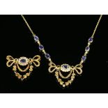 An 18ct gold sapphire and diamond swag necklace and brooch suite