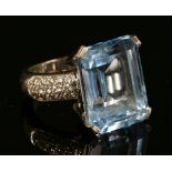 A blue topaz and diamond ring,