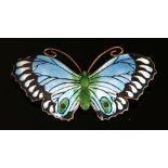 A sterling silver and polychrome butterfly enamel brooch