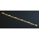 An 18ct gold ruby and diamond bracelet,