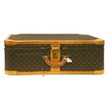 A Louis Vuitton classic monogrammed leather suitcase