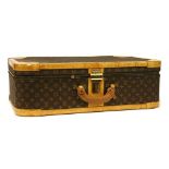 A Louis Vuitton classic monogrammed leather suitcase
