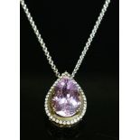 A yellow and white gold kunzite and diamond pear shaped cluster pendant,