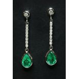 A pair of 18ct white gold emerald and diamond drop earrings,