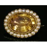 A Georgian gold foiled back citrine and split pearl brooch/pendant,
